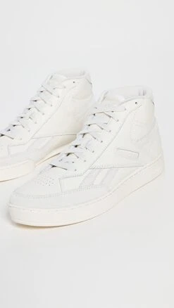 Reebok Club C Form Hi Top Sneakers -Strix Wear Shop rebok303651ebde 1678833852408 2 0. UX357 QL90